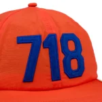 denim-tears-area-code-orange-hat-2